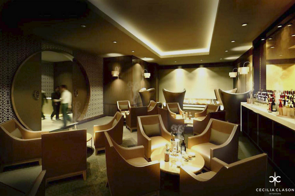 Cigar Lounge - Coffered ceiling & ceiling lights above luxury furniture, wall lamps with circular door in feature wall