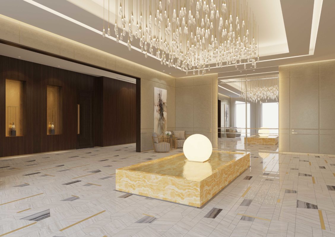 Inner Courtyard Design - Serpeggiante marble floors beneath marble water feature and hanging chandelier
