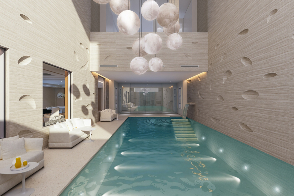 Interior Pool Design - Semi-geometric wall design next to pool, luxury leather sofas and hanging round pendant lighting