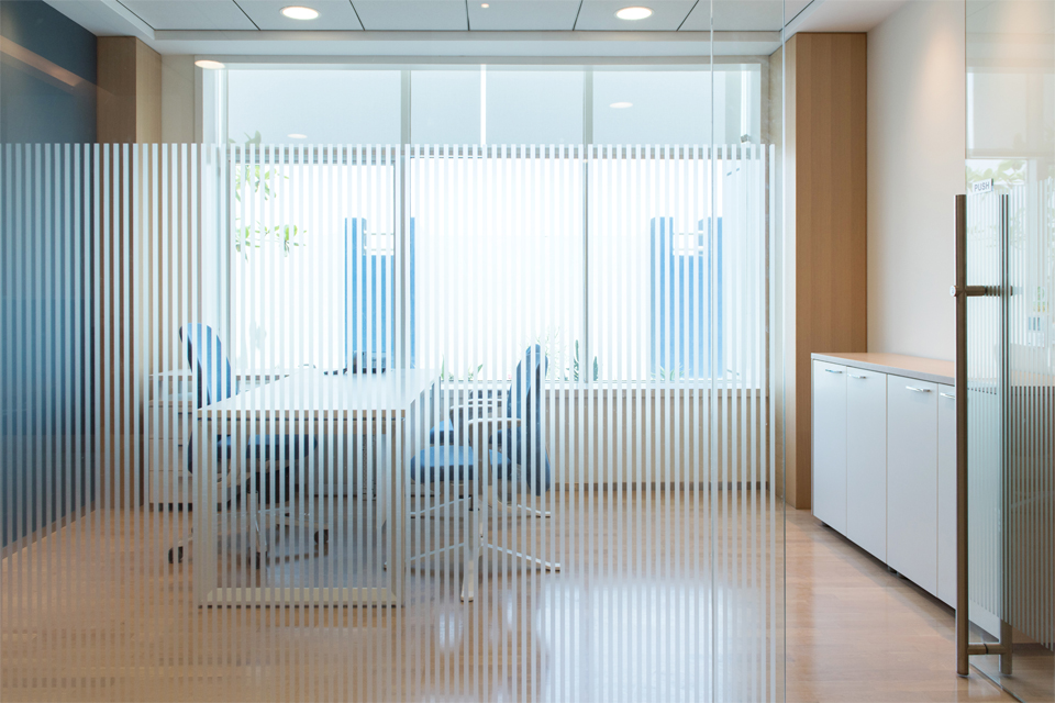 Office Interior Designer - Striped frosted glass behind office